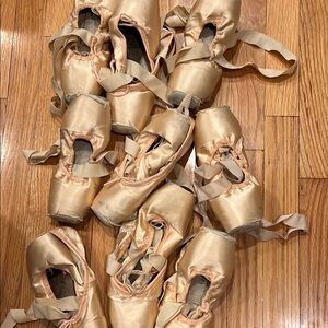 9 pairs of dead pointe shoes